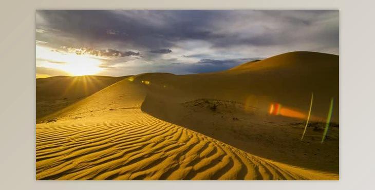 Videohive Sunset Over the Sand Dunes in the Desert 24727417