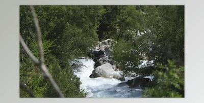 A car wreck got dragged along with a furious river current (Videohive 45912457)